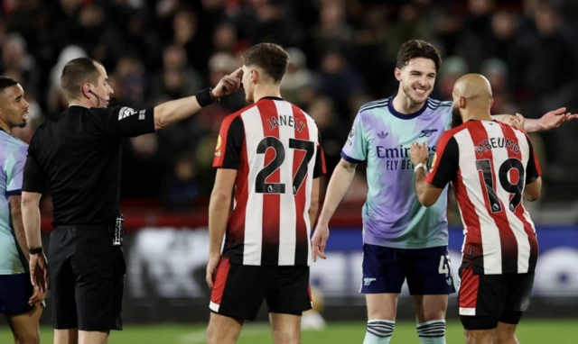 Arsenal's Declan Rice reacts with Brentford's Bryan Mbeumo