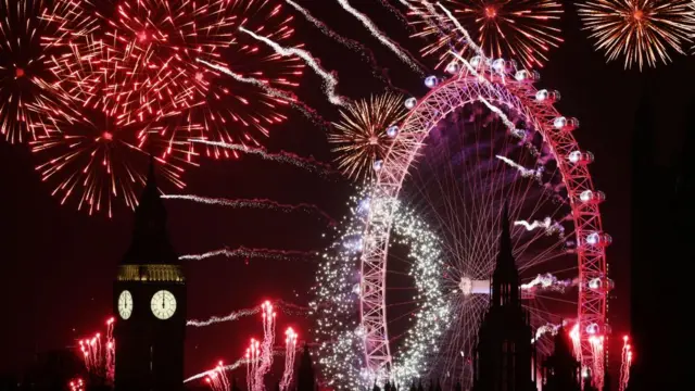 Fireworks are seen lighting up around Big Ben, the London Eye and the rest of the London skyline