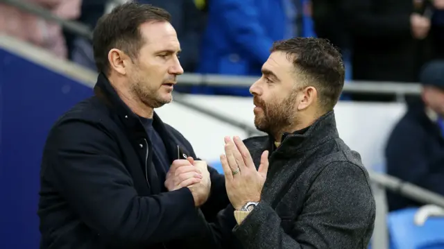Coventry boss Frank Lampard greets Cardiff manager Omer Riza