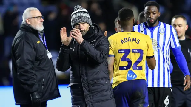Paul Warne claps the Derby fans following their defeat to Sheffield Wednesday
