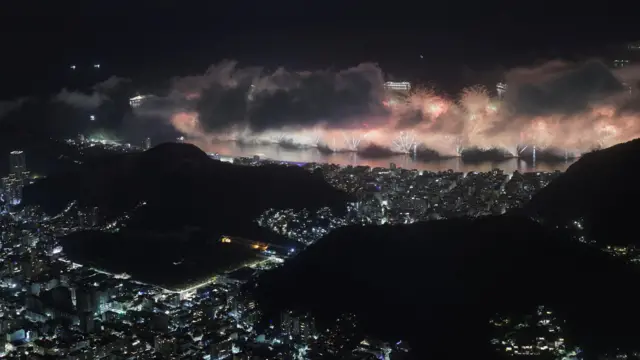 Fireworks explode over Copacabana beach to celebrate the New Year in Rio de Janeiro, Brazil