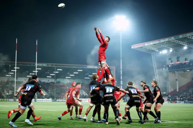 Max Douglas of Scarlets jumps for the ball