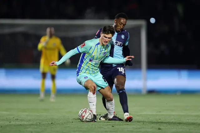 Freddie Potts of Portsmouth controls the ball