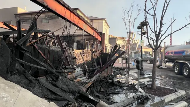 Burnt-out buildings on Sunset Boulevard