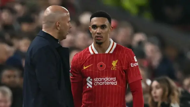 Arne Slot and Trent Alexander-Arnold