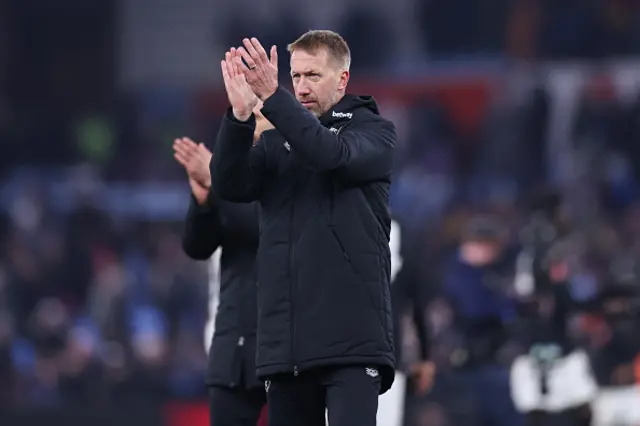 Graham Potter, head coach of West Ham United, acknowledges the travelling support