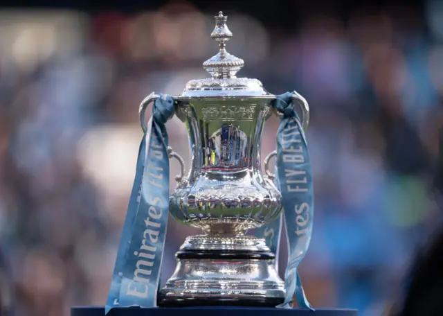 The FA Cup trophy is seen prior to a match between Manchester City and Huddersfield Town