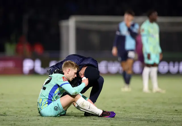 Paddy Lane of Portsmouth receives medical treatment