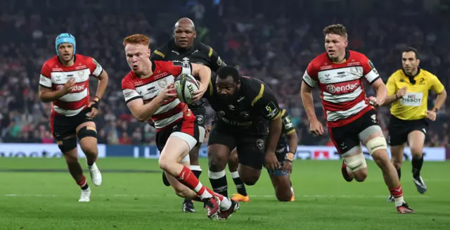 Caolan Englefield running with ball against Wasps