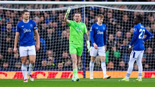 Jordan Pickford of Everton reacts after conceding