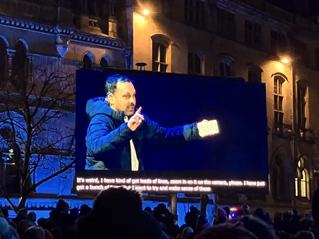 Screens showing man performing a trick