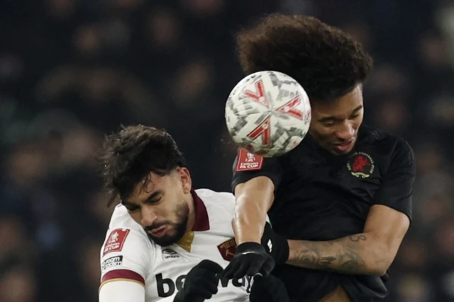 West Ham United's Lucas Paqueta in action with Aston Villa's Boubacar Kamara