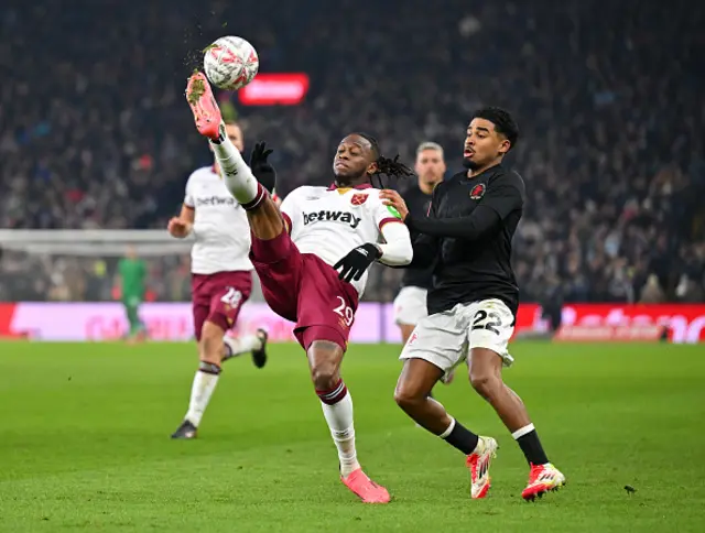 Aaron Wan-Bissaka of West Ham United clears the ball