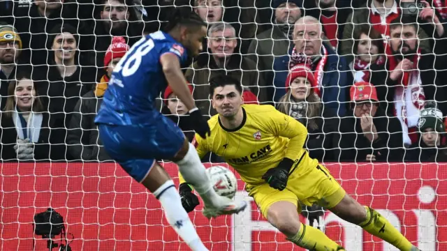 Chelsea's Christopher Nkunku has his penalty saved by Morecambe's Harry Burgoyne