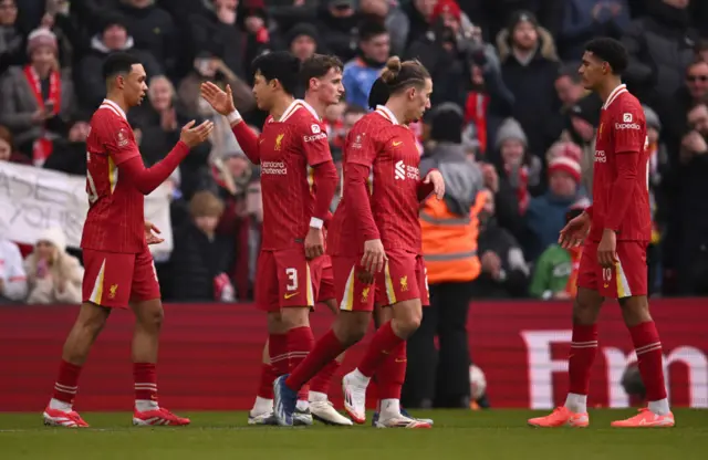 Liverpool players celebrate after going 2-0 in front