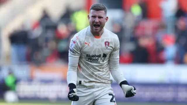 Rotherham goalkeeper Dillon Phillips celebrates