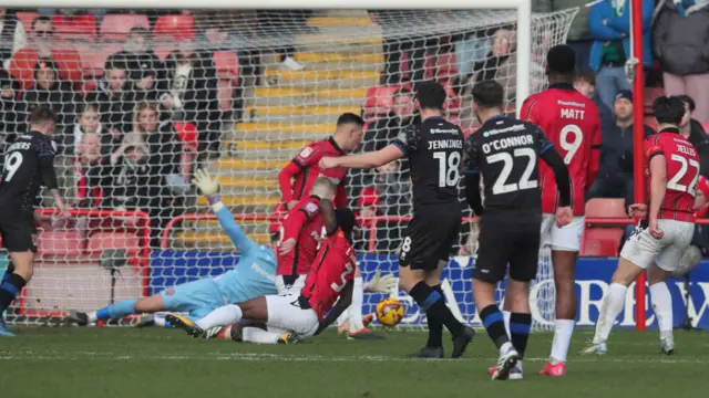 Connor Jennings pulls a goal back for Tranmere, firing through a crowded penalty area