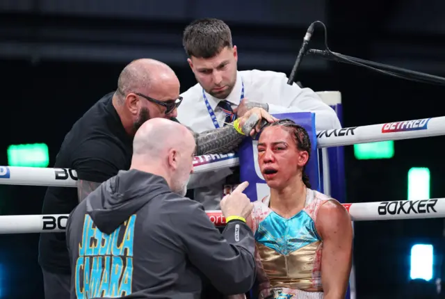 Blood pours from Jessica Camara's head in a fight