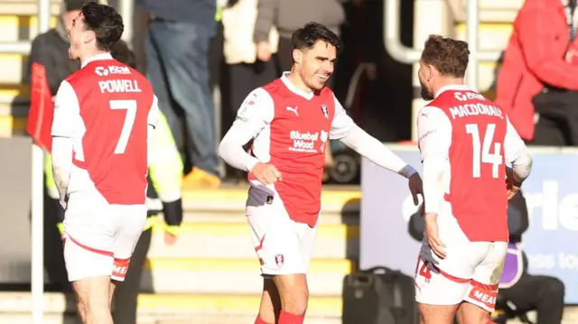 Rotherham players celebrate Reece James' goal against Bolton