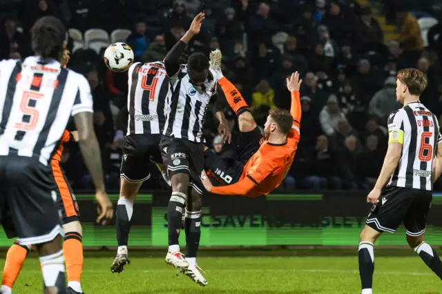 United's Louis Moult scores