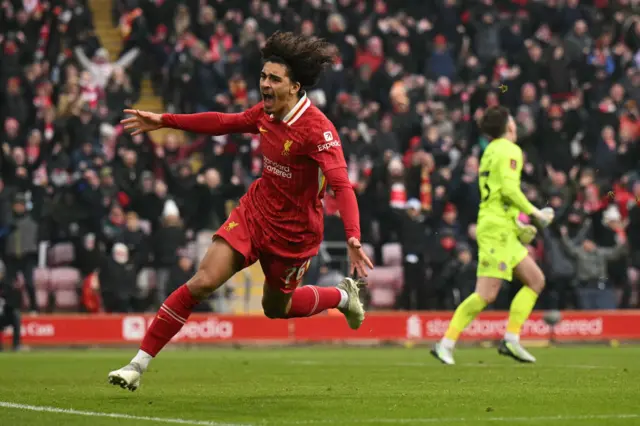 Jayden Danns celebrates after scoring for Liverpool