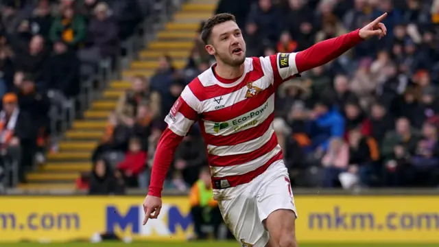 Doncaster Rovers Luke Molyneux celebrates