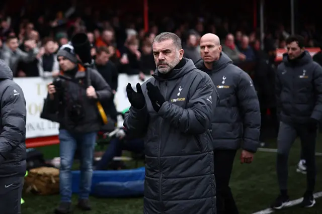 Tottenham Hotspur's Greek-Australian Head Coach Ange Postecoglou arrives