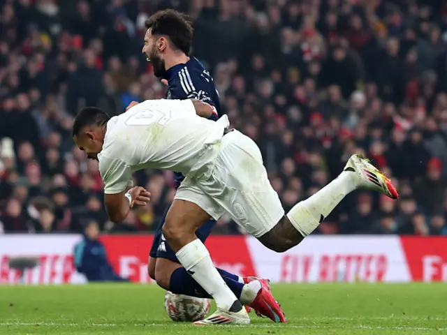 Bruno Fernandes of Manchester United is challenged by Gabriel Jesus