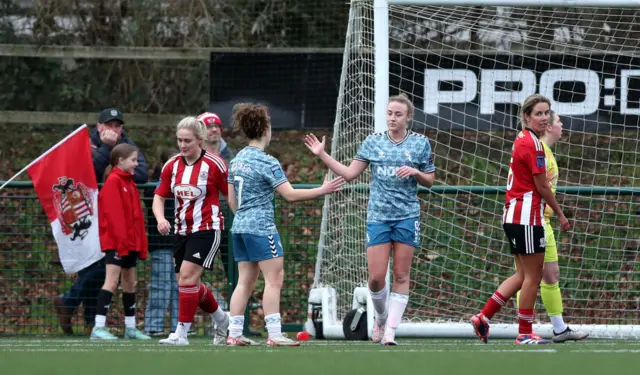 Eleanor Dale of Sunderland celebrates scoring her team's seventh goal.