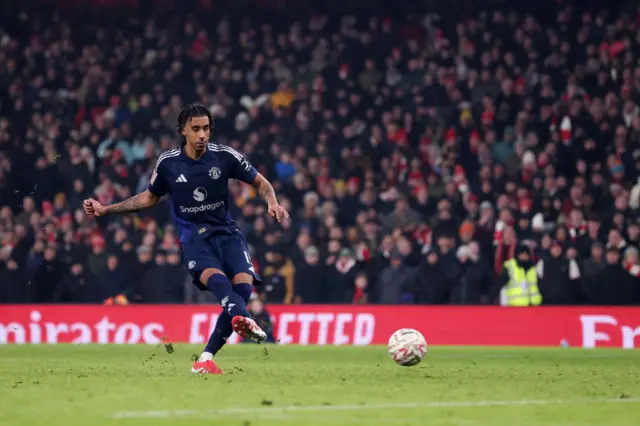 Leny Yoro scores his penalty against Arsenal