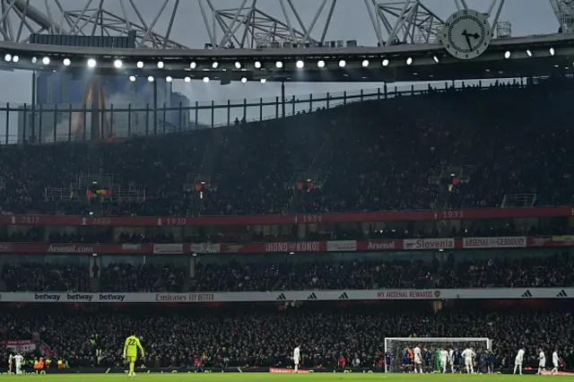 David Raya stands in the middle of the pitch