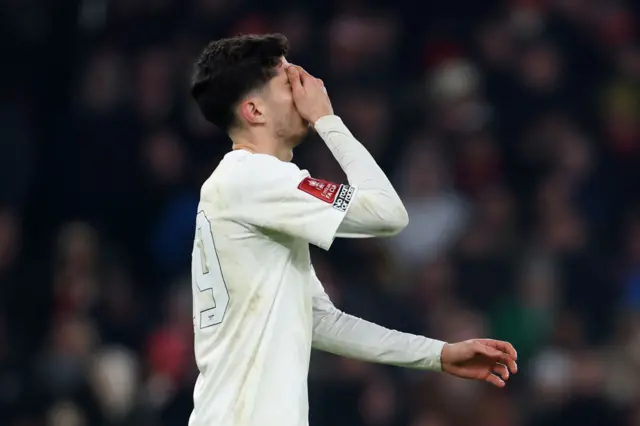 Kai Havertz looks in dismay after missing a penalty against Man Utd