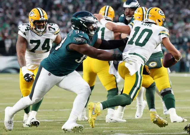 Green Bay Packers quarterback Jordan Love runs the ball against the Philadelphia Eagles