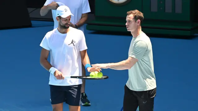 Novak Djokovic with coach Andy Murray