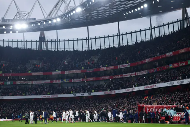 Players of Arsenal walk out