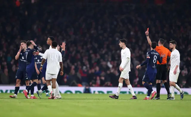 Diogo Dalot of Manchester United receives a red card