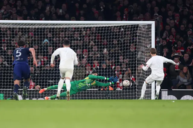 Altay Bayindir of Manchester United saves a penalty