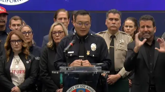 Dominic Choi of the LAPD speaking at a press conference