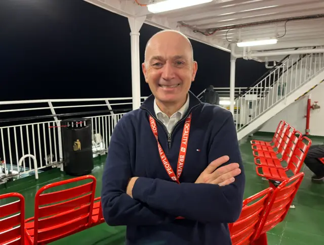 CalMac boss Duncan Mackison on the deck of the Glen Sannox