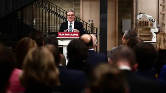 Britain's Prime Minister Keir Starmer delivers a speech during a visit of the Manufacturing Futures Lab at UCL (Unnivesrity College London), in London, on January 13, 2025, as he prepares to launch a plan to harness AI to spur growth and efficiency in the country.