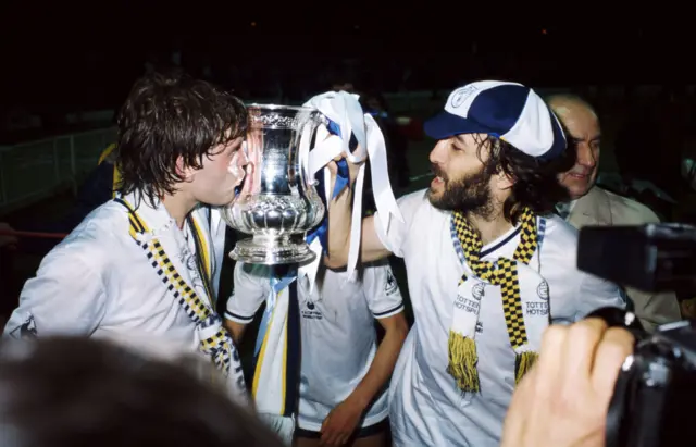 Ricky Villa kisses the FA Cup trophy