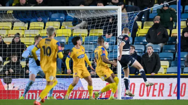 Casper De Norre volleys Millwall's second goal against Dagenham & Redbridge