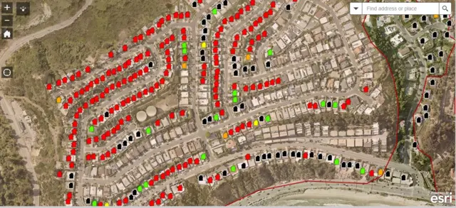 Map showing Eaton fire, with predominantly red markers covering a neighbourhood along with scattered green, orange, yellow and black markers