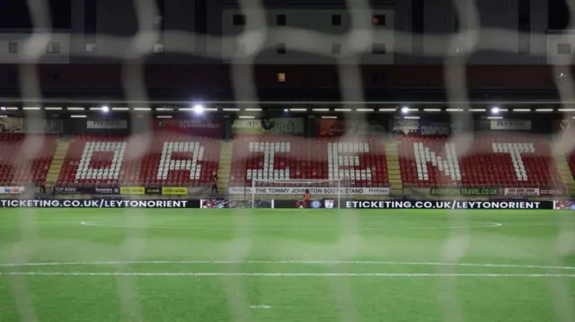 The view through one of the goal nets at Leyton Orient's Brisbane Road