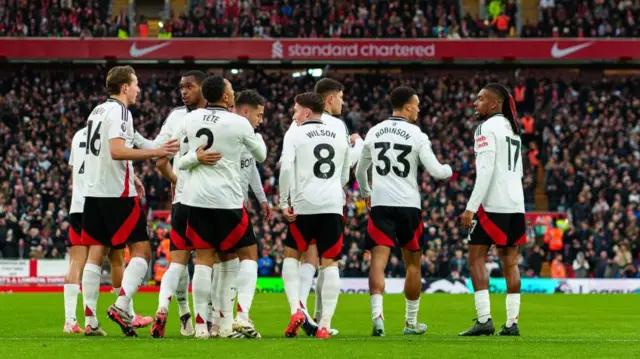 Andreas Pereira of Fulham celebrates with his teammates after scoring