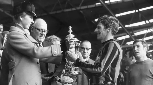 Tony Book is presented with the FA Cup by Princess Anne after beating Leicester by 1-0 at Wembley in 1969