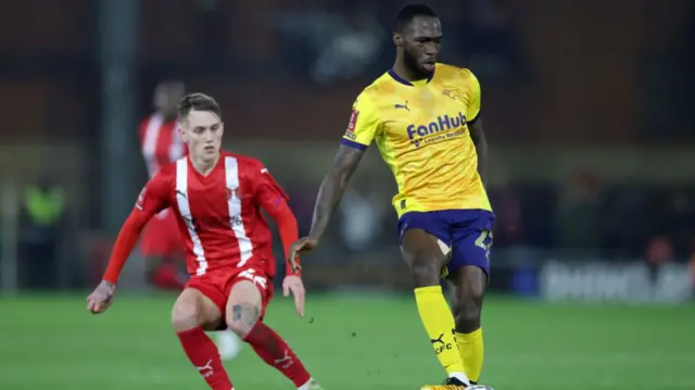 Derby's Corey Blackett-Taylor plays a pass as Leyton Orient's Ethan Galbraith tries to close him down