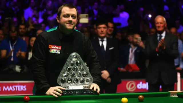 Mark Allen with the Masters trophy