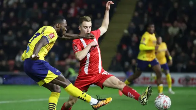 Derby's Corey Blackett-Taylor sends a ball into the box, closed down by Leyton Orient's Jack Currie