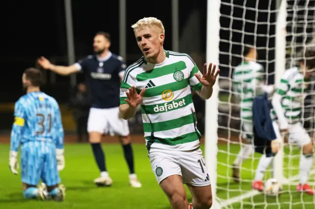 DUNDEE, SCOTLAND - JANUARY 14: Celtic’s Luke McCowan celebrates after scoring to make it 1-0 during a William Hill Premiership match between Dundee and Celtic at the Scot Foam Stadium at Dens Park, on January 14, 2025, in Dundee, Scotland. (Photo by Paul Devlin / SNS Group)